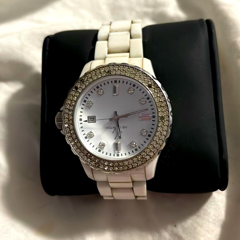 Toy white ceramic watch with Swarovski crystals. Needs new battery